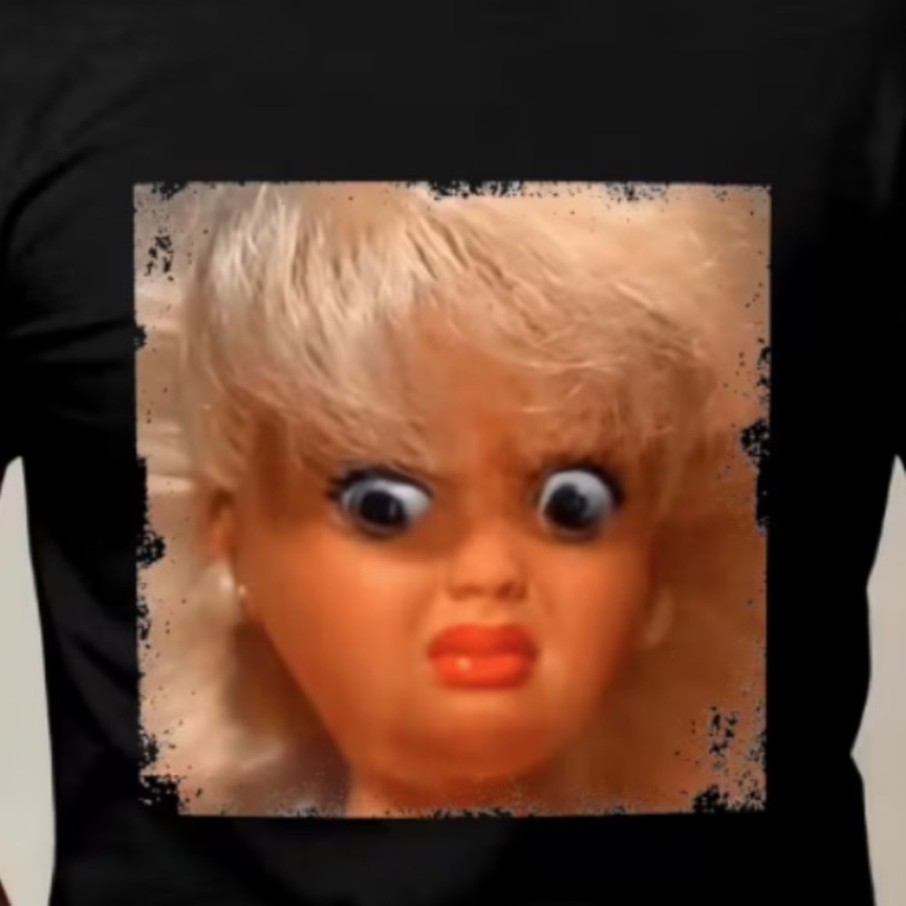 NEW! Blonde Disgusted Doll Face T-Shirt - Picture 1 of 1